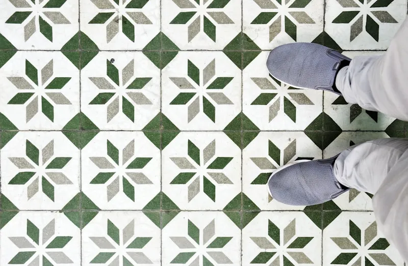 Green and white star-pattern tile floor