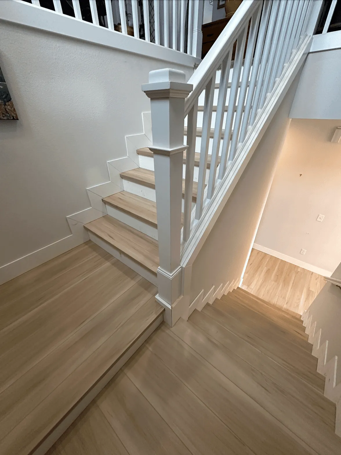 New stair treads and landing matched to the hallway floor